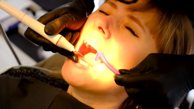 Woman at the dentist office. Selective focus. copy space.