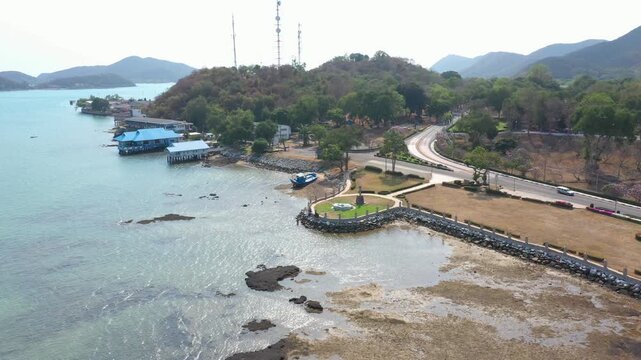 Aerial footage of Sattahip district located in Chomburi province.