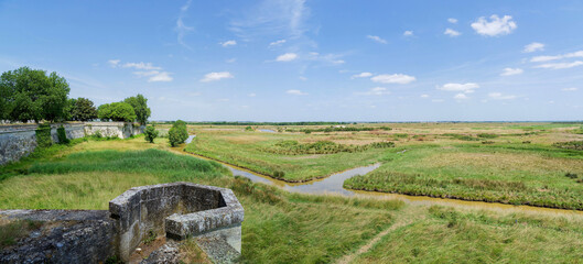 The ramparts of Brouage, fortifications around the Citadel punctuated with bastions, turrets or watchtowers on high embankments overlooking the canals and marshy lands of Charente   © Marc