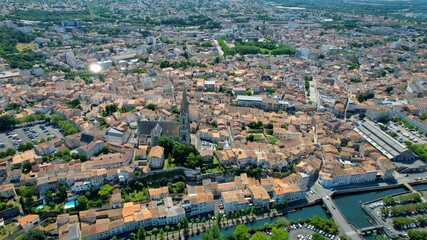 Obraz premium Aerial view beside the old town of the city Niort, France on a sunny summer morning