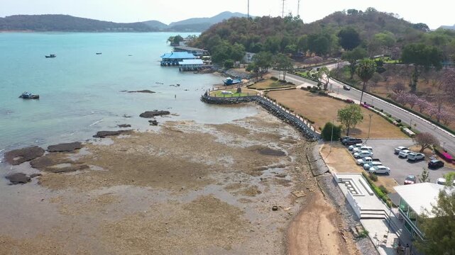Aerial footage of Sattahip district located in Chomburi province.