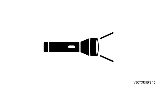 Black flashlight with light beams shining.