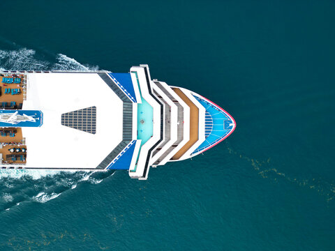 Ship top view. Luxury liner resort. Cruise ship voyage. Travel destination. Aerial top view of cruise in summer vacation. Cruise ship tour and travel at sea. Aerial view of luxury liner voyage