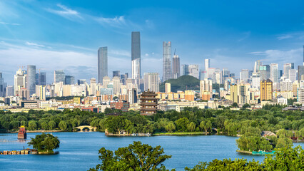 Fototapeta premium Modern Urban Skyline With Traditional Pavilion And Lake View