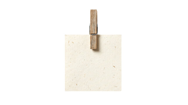 Blank square handmade paper note held by a wooden clothespin on a transparent background