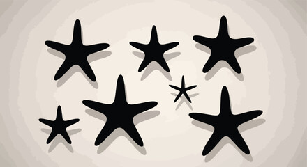 Obraz premium Collection of Dark Black Starfish on a White Surface.