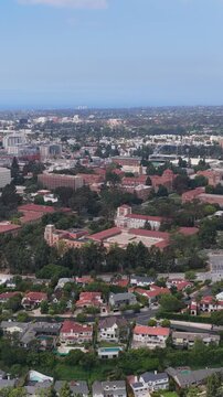 University of California Los Angeles UCLA flying towards Westwood Village Bel Air homes and Wilshire Corridor skyline on Westside