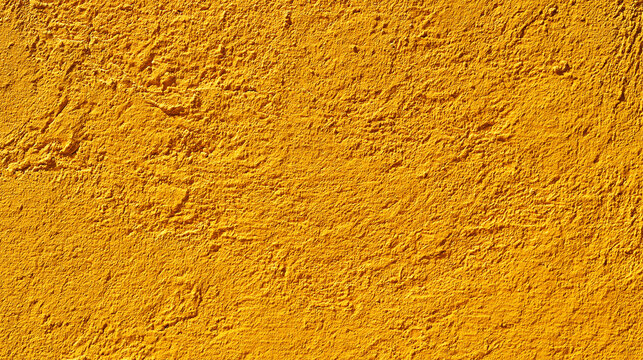 Vibrant Yellow Stucco Texture Background With Natural Sunlit Surface Details