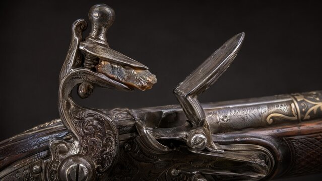flintlock. Close-up detail of ornate flintlock pistol focusing on flint against frizzen. product launch decks, UI/UX mockups, designed for data visualization dashboards and holographic UIs.