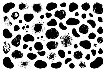 Fototapeta premium Abstract black ink blots and splashes on white background.