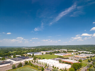 Obraz premium Aerial view of industrial park and green landscape