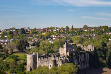 Fototapeta premium Panoramic view of Chepstow Castle ruins overlooking the River Wye with the town in the background