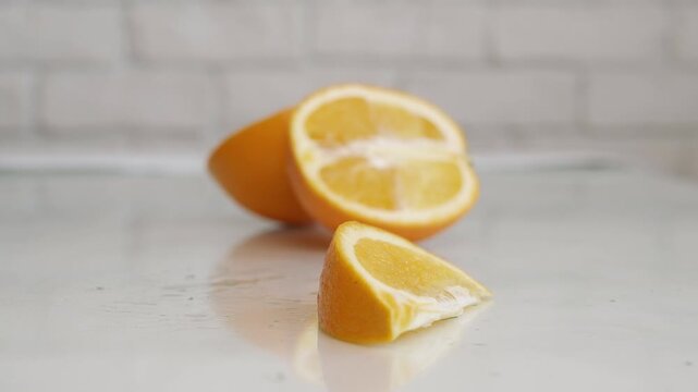 Blurred Shooting with an Orange Fruit Cutted in Slices, a Delicious and Sweet Vegan Dessert for Breakfast.