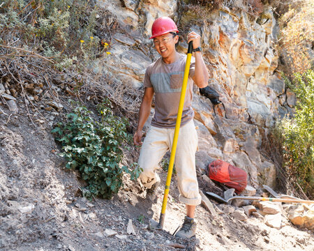 portrait Volunteering laborer construction trail building outside