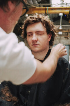 Hair Stylist Working on a Model