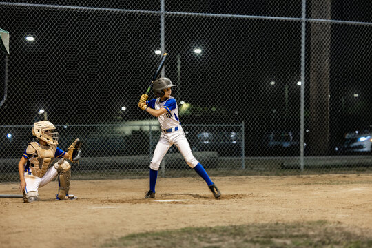 Batter and catcher in action during game