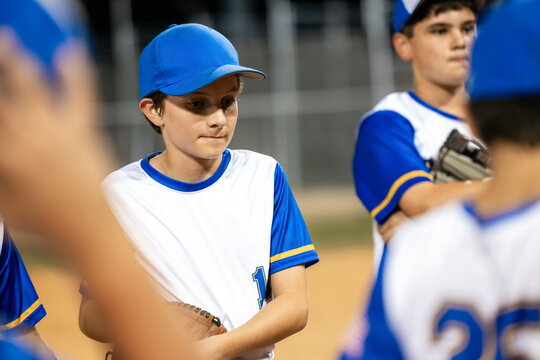Coach Talks to Baseball Team During Practice