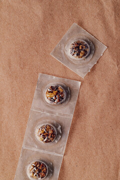 psilocybin magic truffles microdoses on brown paper background