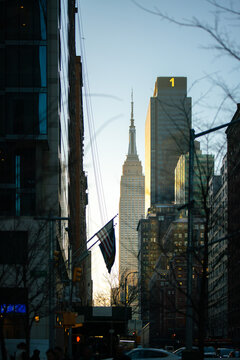 Empire State Building framed by NYC skyline at sunset