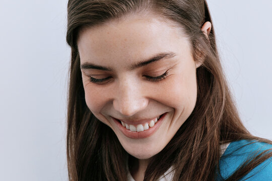 Closeup beauty portrait of happy woman with natural skin