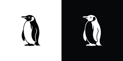 Obraz premium Black and white penguin standing on flat surface with clean silhouette style