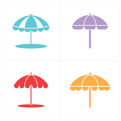 Obraz premium Colorful beach umbrellas with turquoise purple orange and red striped canopies