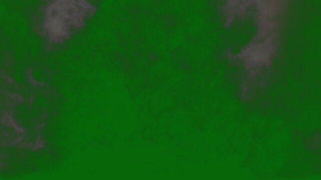realistic fire explosion effect on isolated Green Screen background, fog or mist motion video colourful light smoke explosion realistic smoke trails 4K video.	