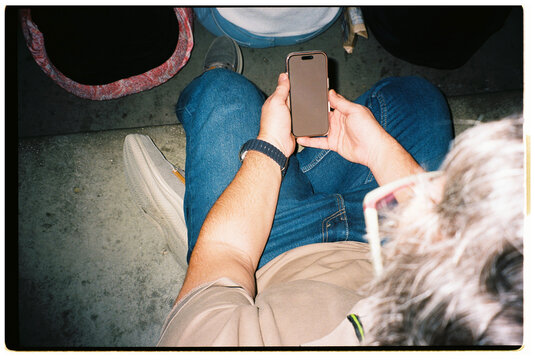 Blank Screen Smartphone in Stadium Stands
