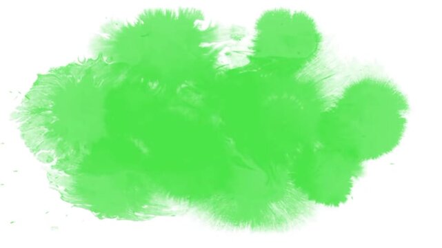Green screen ink splash transition with watercolor blots spreading on white background