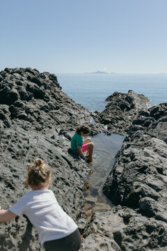 Children Exploring Rockpool, Eimeo Queensland