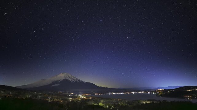 (HDR PQ Timelapse) Remastered Starry Night over Mount Fuji and Lake Yamanaka. Bright and Color‑Enhanced Starry Sky.
