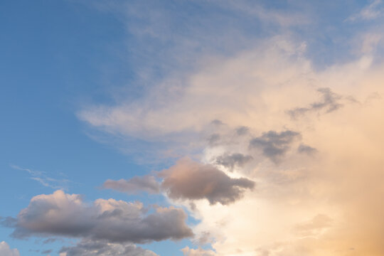 Gorgeous orange tinted clouds and blue sky