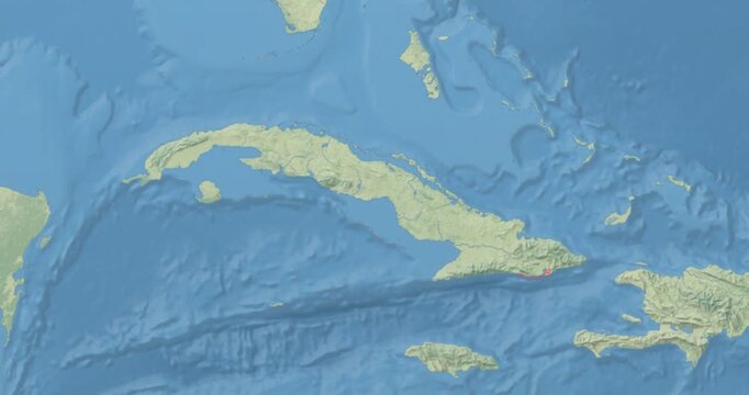 Cuba on Globe. Zoom into the country with Earth spinning on dark background. Physical world map with Cuba and label on it. Country view animation.