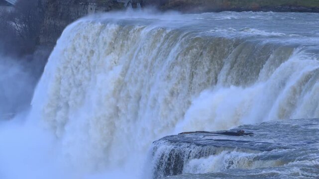 This video depicts Niagara Falls, a natural landmark straddling the border between the United States and Canada.