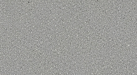 Fototapeta premium Close-up view of gray terrazzo surface with small speckled aggregate stones and concrete texture
