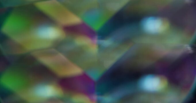 Patterned background. Blur geometric overlay. Defocused yellow blue color shine lens flare glare flicker sparkle gleam on abstract light art.
