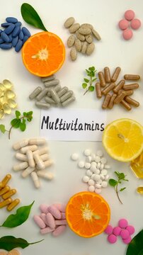 Various tablets and capsules, supplements and vitamins. Selective focus.