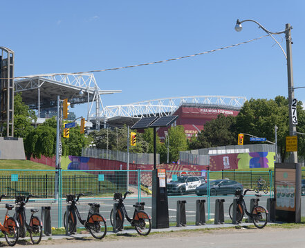wide view of Toronto Stadium (BMO Field) decked out with FIFA World Cup 2026 host city banners and signage, seen from Martin Goodman Tr, Ontario Dr