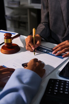 Consultation and conference of professional businesswoman and Male lawyers working and discussion having at law firm in office. Concepts of law, Judge gavel with scales of justice