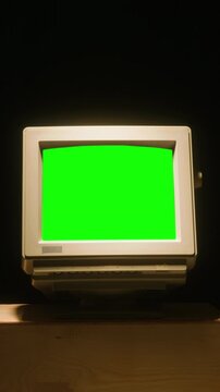 Retro pc computer gaming, Desktop vintage with loading code console, programmer making scripts, green basic screen, Old computer studio close-up, retro wave display, late 90s PC.