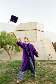 High school graduate in cap and gown