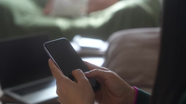 Person scanning a smartphone using handheld scanner for payment verification. Contactless payment, QR code transaction, digital authentication, fintech technology, secure mobile payment concept