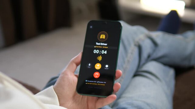 Receiving an incoming call from a Taxi Driver on a smartphone. The screen displays a yellow car icon with answer and decline buttons. Perfect for ride-sharing apps, urban mobility, and logistics