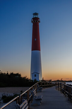 Barnegat Lighthouse at twilight with boardwalk, New Jersey