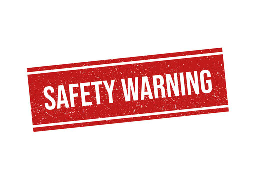 Red rubber stamp with the text safety warning inside a rectangular box