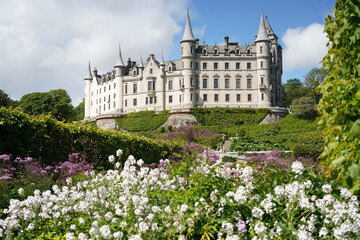 Fototapeta premium Gothic Revival Castle with Tall Turrets on Hilltop