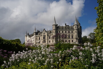 Obraz premium Gothic Revival Castle with Tall Turrets on Hilltop