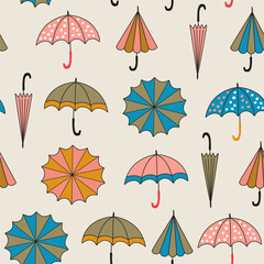Obraz premium Seamless pattern with umbrellas. Wallpaper for children room. Weather background. Vector illustration of umbrella pattern. Weather print.
