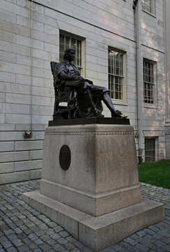 Cambridge, MA - USA - 08-03-2025: John Harvard statue on the campus of Harvard University