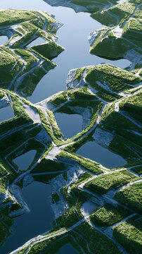 Aerial view of intricate green and blue patterns formed by water and land.